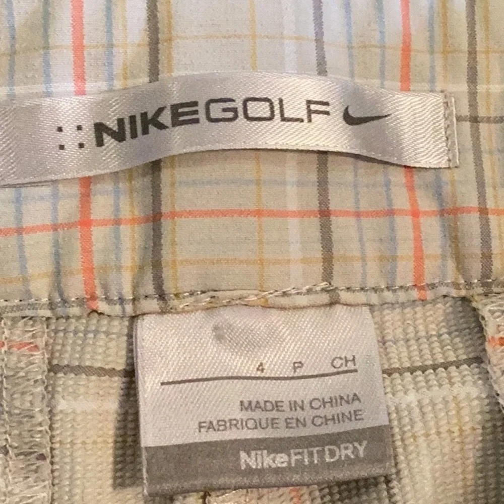 Nike Dri-Fit plaid gold shorts. Women’s size 4